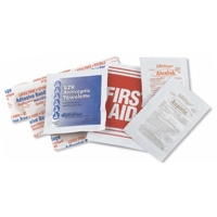 First aid kit with bandages, antiseptic wipe, antacid tablets, aspirin...