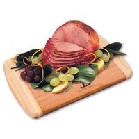 Honey cured spiral-sliced boneless ham with bamboo cutting board.... from ASI...