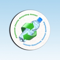 Round 1/4" thick 4" diameter recycled bottle coaster with recycled tire......