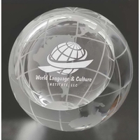 3" glass paperweight with frost-colored longitude and latitude lines.... from...