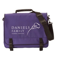 Flap over briefcase with self-fabric piping trim and accessory pockets.......