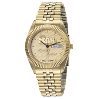 Watch with a gold tone rippled bezel, gold-plated stainless steel case......