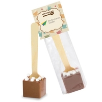 Header bag filled with hot chocolate on a spoon (milk chocolate... from ASI...