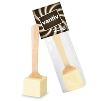 Header bag filled with hot chocolate on a spoon (white chocolate);... from...