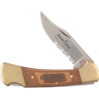 Folding pocket knife with a half serrated blade and a wood... from ASI 59685...