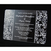 Laser-engraved, acrylic invitations measure 4" x 5" to fit standard-sized...