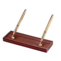 Rustic brown leather double pen stand with a protective felt bottom.... from...