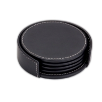 Set of four round coasters made of rustic black leather with... from ASI...
