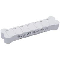 Dog-bone shaped pillbox with compartments for every day of the week.... from...