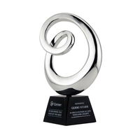 Genesis chrome art sculpture award embedded into genuine black granite.......
