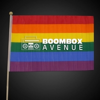 12" x 18" plastic rainbow-colored flag with 23" wooden stick... from ASI...