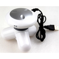 Compact USB massager with 3-point design for stress relief anywhere.... from...