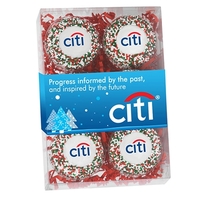 Six pack of chocolate covered Oreos® featuring holiday nonpareil...