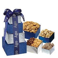 Snack tower with four boxes containing English butter toffee, pistachios,...