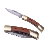 Brass and rosewood pocket knife with locking blade