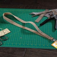 20 3/8" x 3/4" Roper leather lanyard strap with 11 Irish... from ASI 88060...