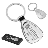 Water droplet shaped metal keyholder with matte finish and chrome accents.......