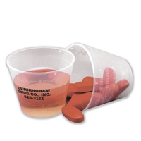 Plastic medicine cup with raised calibrations in ml, tsp., tbs., oz.,... from...