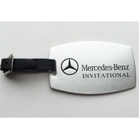 3" X 2" Barrel shaped Aluminum Bag Tag w/ a leather strap