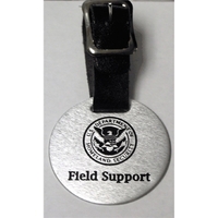 1 3/4" Round Aluminum Bag Tag with a leather strap