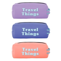 Neoprene toiletries bag inspired by the classic Dopp kit; features colored......