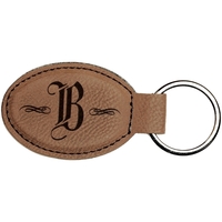 3" x 1.75" x 0.1875" oval-shaped leatherette keychain with metal split......