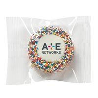 Custom white chocolate covered Oreo® cookie with rainbow nonpareil sprinkles,...