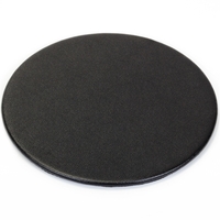 Black coaster made of leatherette material with a thin metal core.... from...