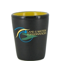 1.5 oz. ceramic shot glass with a yellow interior and black... from ASI 46573...
