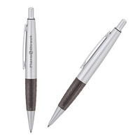 Ballpoint pen with solid brass cap, textured transparent grip, push-action...