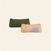 Medium-size, long 600D Poly pouch with zippered closure for holding...