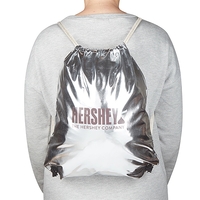 PU leather drawstring backpack with metallic design and dual shoulder...