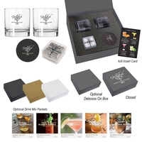 Whiskey kit featuring two glasses, ice cubes, and two bonded leather... from...