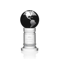 The Colvernstone Globe Award features an exquisite 4" Black Optical...