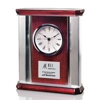 Modern mantle clock with a combination of chrome and rosewood.... from ASI...