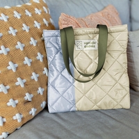 Main Squeeze Tote. It's simple and straightforward, but this small, flat......