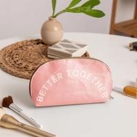 Glam Clam is a medium-size, gusseted pouch with a curve from... from ASI...