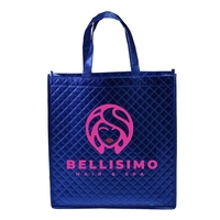 Non-woven tote bag with reflective metallic lamination and 19.6" handles.......