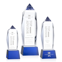 Lustrous optical crystal award with beautifully, beveled peaks and a Blue......