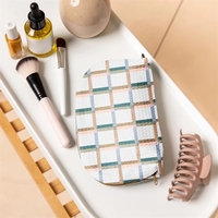 Glam Clam is a medium-size, gusseted pouch with a curve from... from ASI...
