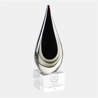 The Art Glass Black Rain Teardrop Award consists of shades of... from ASI...