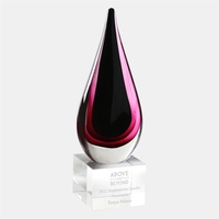 The Art Glass Poppy Black Teardrop Award consist black and red... from ASI...