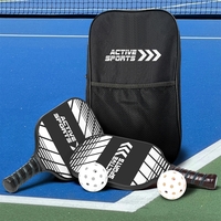 Pickleball set with pickleball paddles, two pickleballs, and a carry...