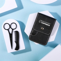 Facial hair kit. Includes stainless steel shears and a plastic comb... from...