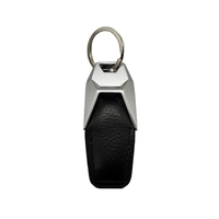 Silver metal keyring with PU leather plus debossed on 1 side... from ASI...