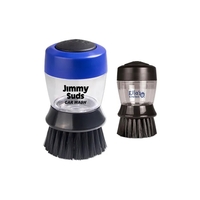 Plastic and rubber dishwashing scrubber with liquid soap dispenser.... from...