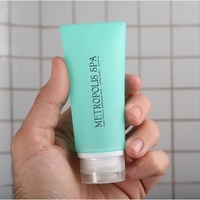 3 oz. travel-size silicone bottle with leakproof design and flip-up lid.......