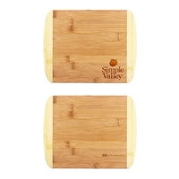 11" x 8 3/4" two-tone cutting board that's made of bamboo.... from ASI 88060...
