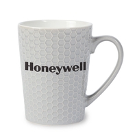 16oz. terra cotta tapered mug with honeycomb pattern, resembles a golf......