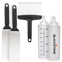 Griddle essentials toolkit: 2 squeeze bottles, 2 spatulas, 1 scraper....